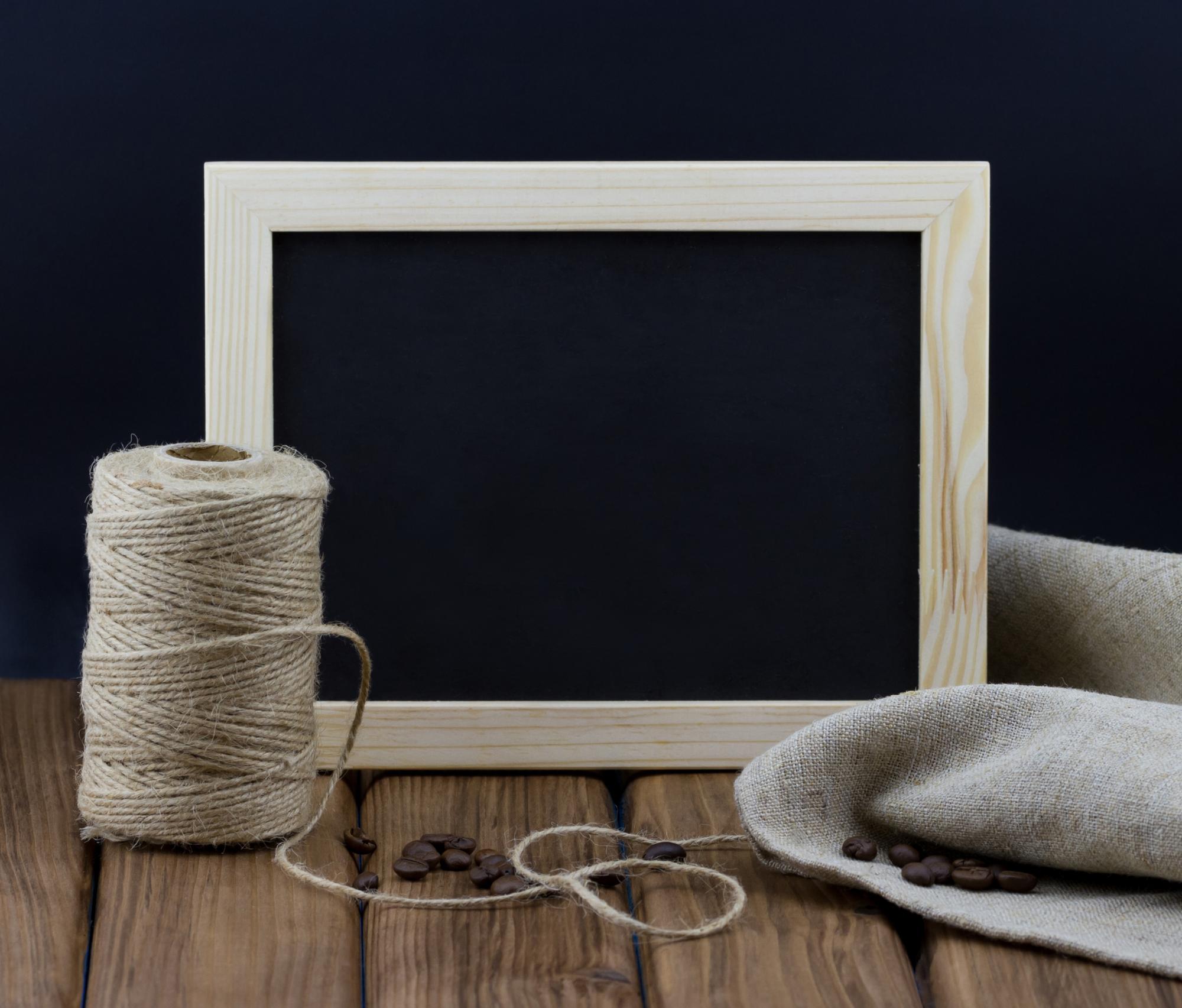 Studio with threads and framed embroidery